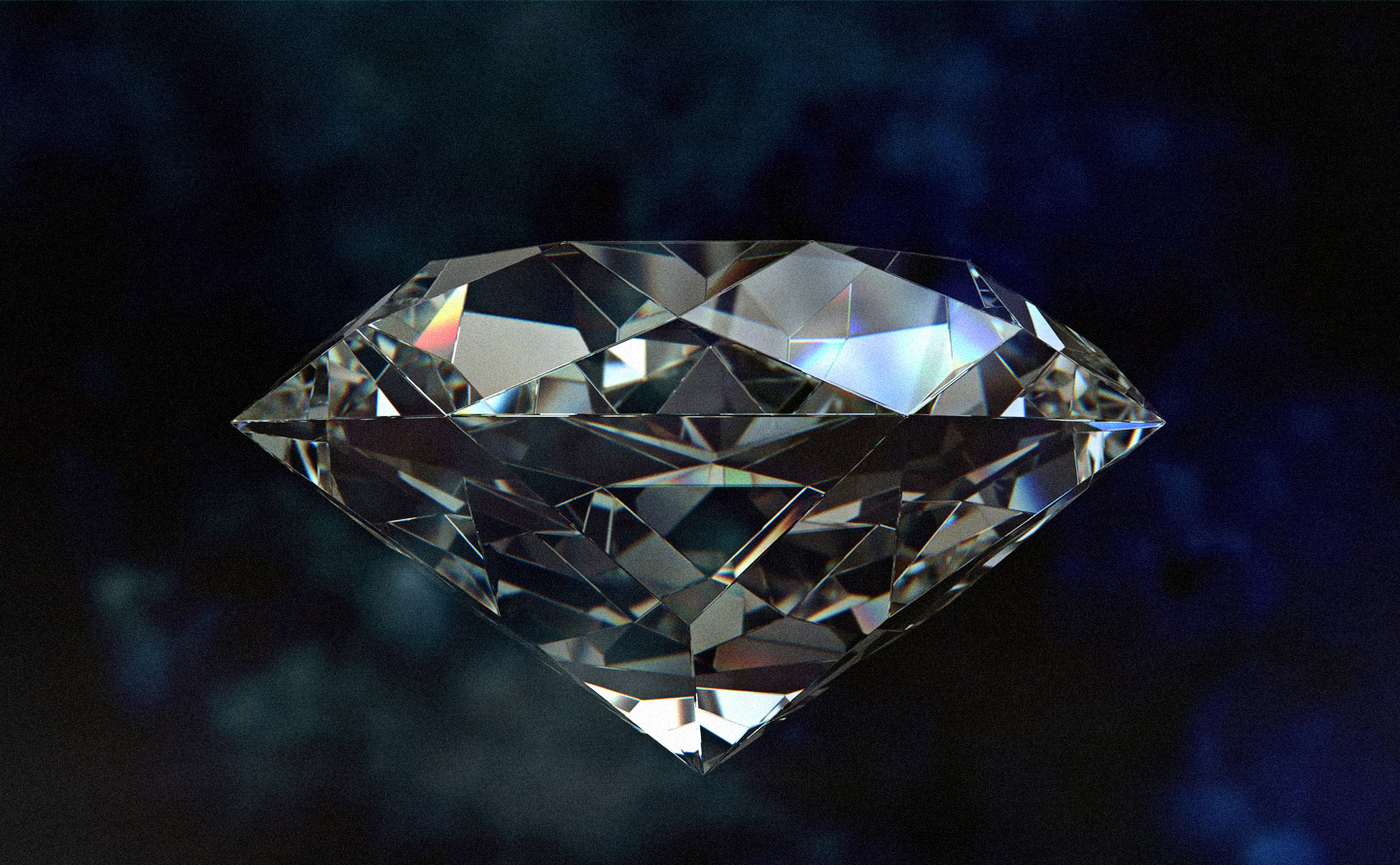 Diamant taillé en brillant montrant la dispersion spectrale de la lumière avec feux arc-en-ciel, illustration de l'excellence de la taille et de la réfraction prismatique